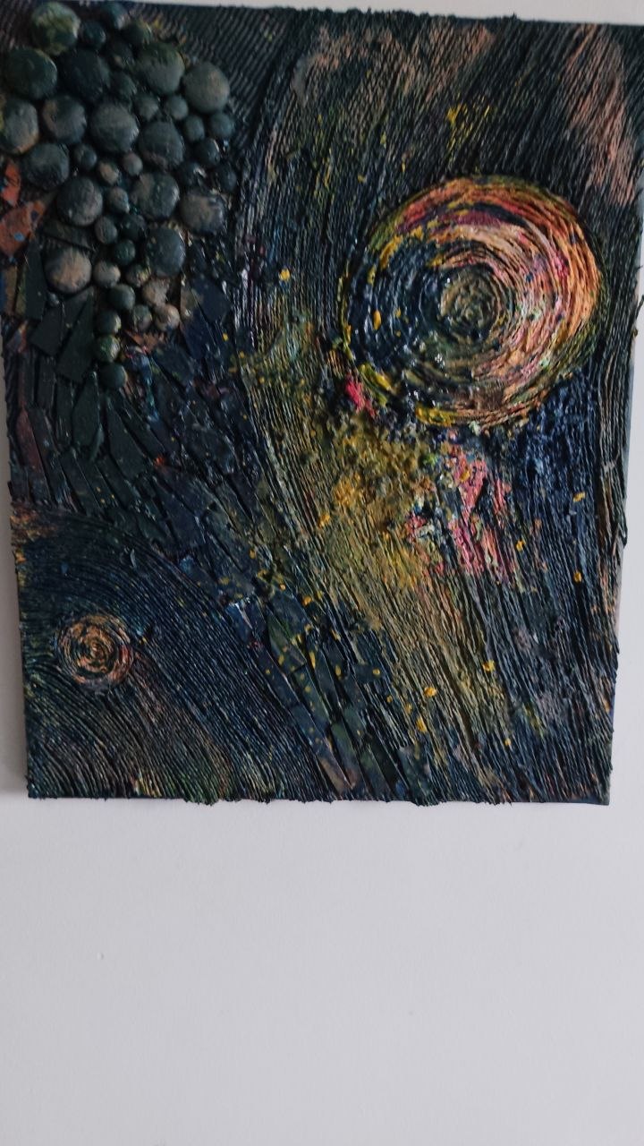 Textured mixed-media panel with dark swirling impasto and bright spiral bursts