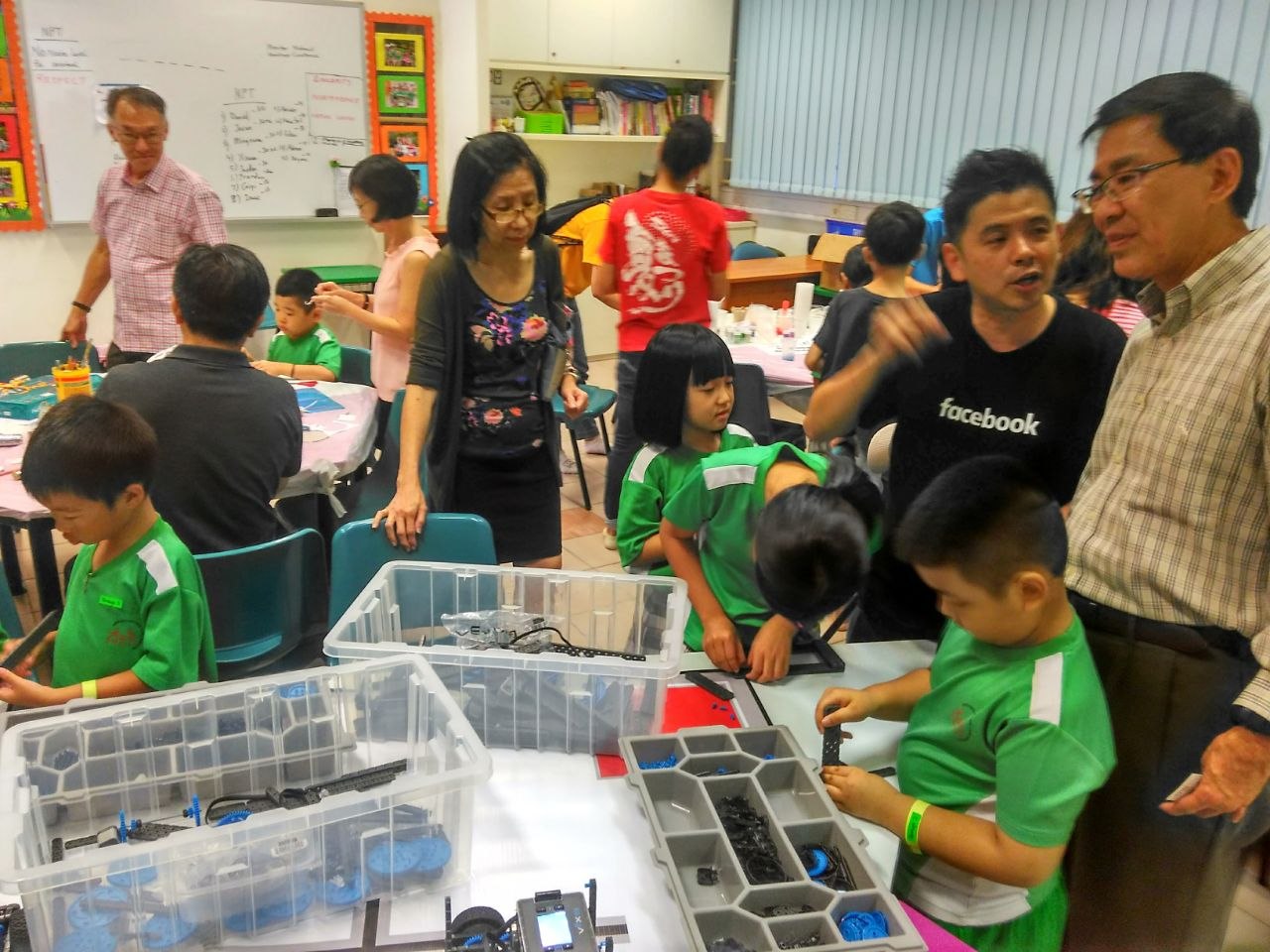 Hands-on robotics workshop with children and adults working together