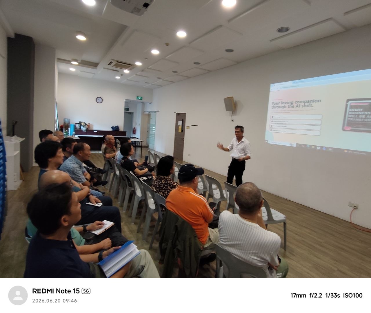 Sagelion workshop: a speaker walks a room of seniors and PMETs through the AI shift