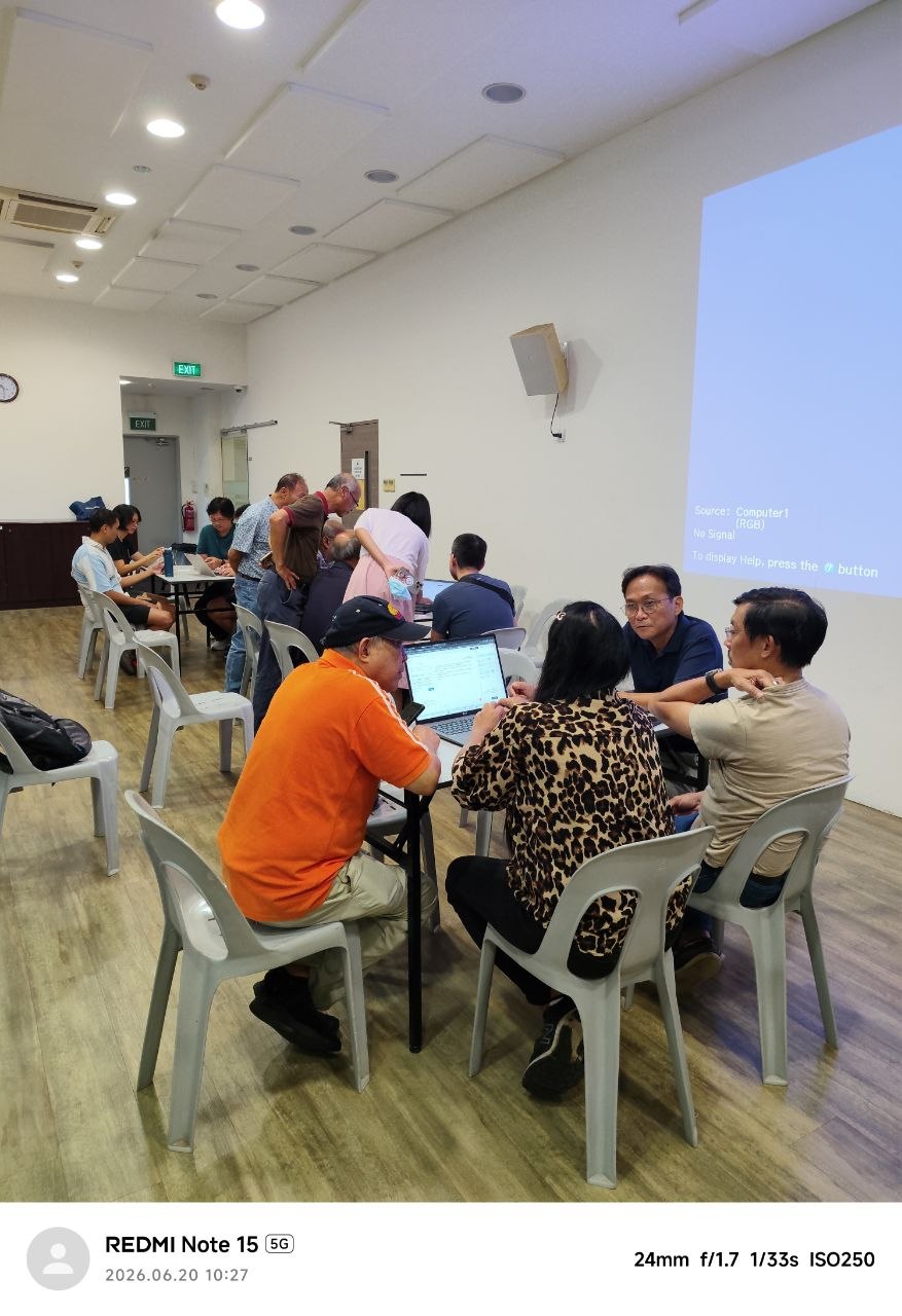 Sagelion AI workshop — participants working together at laptops, 20 June 2026, 10:27am